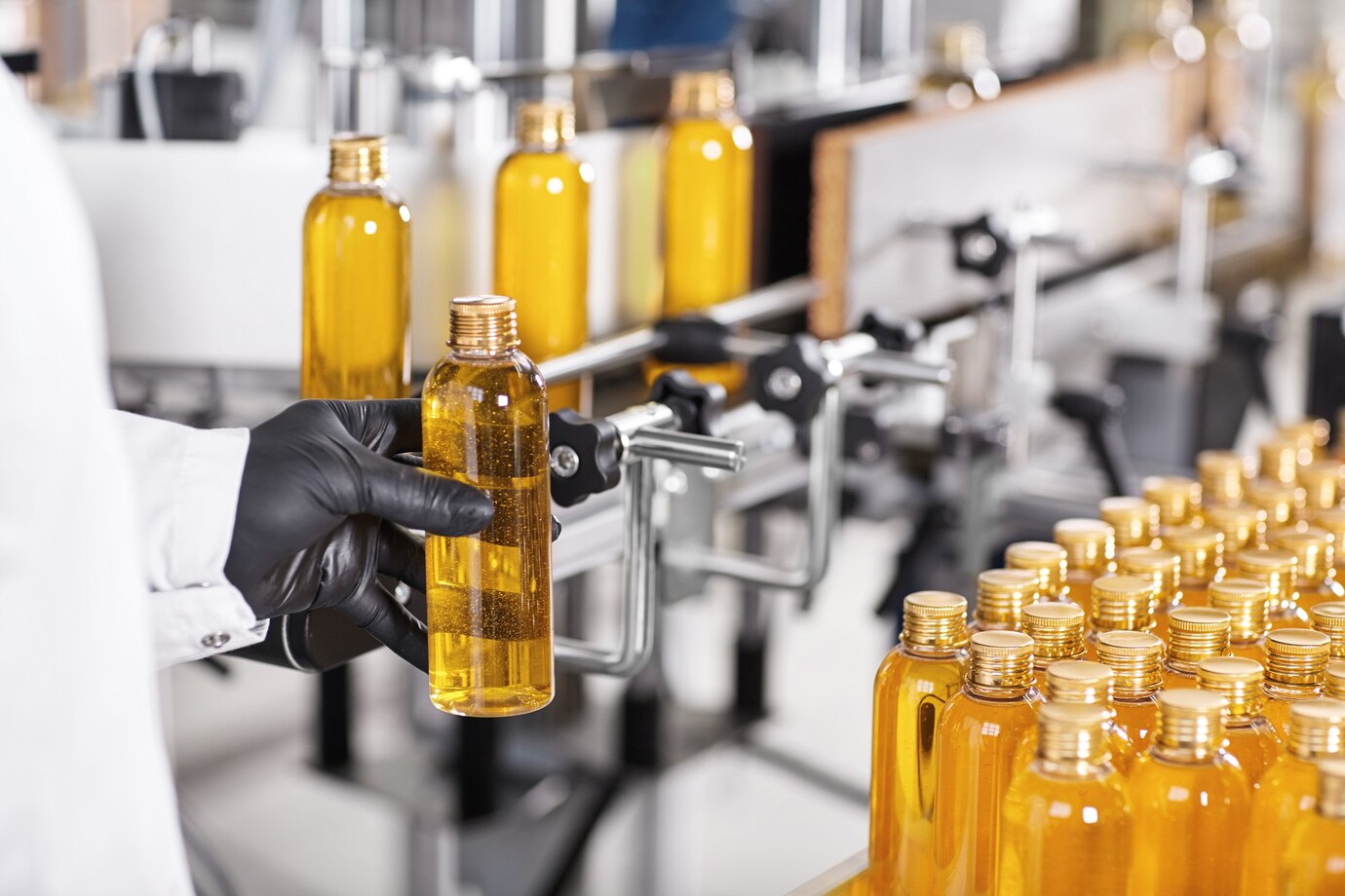 transparent-plastic-bottles-filled-with-yellow-substance_273609-13382